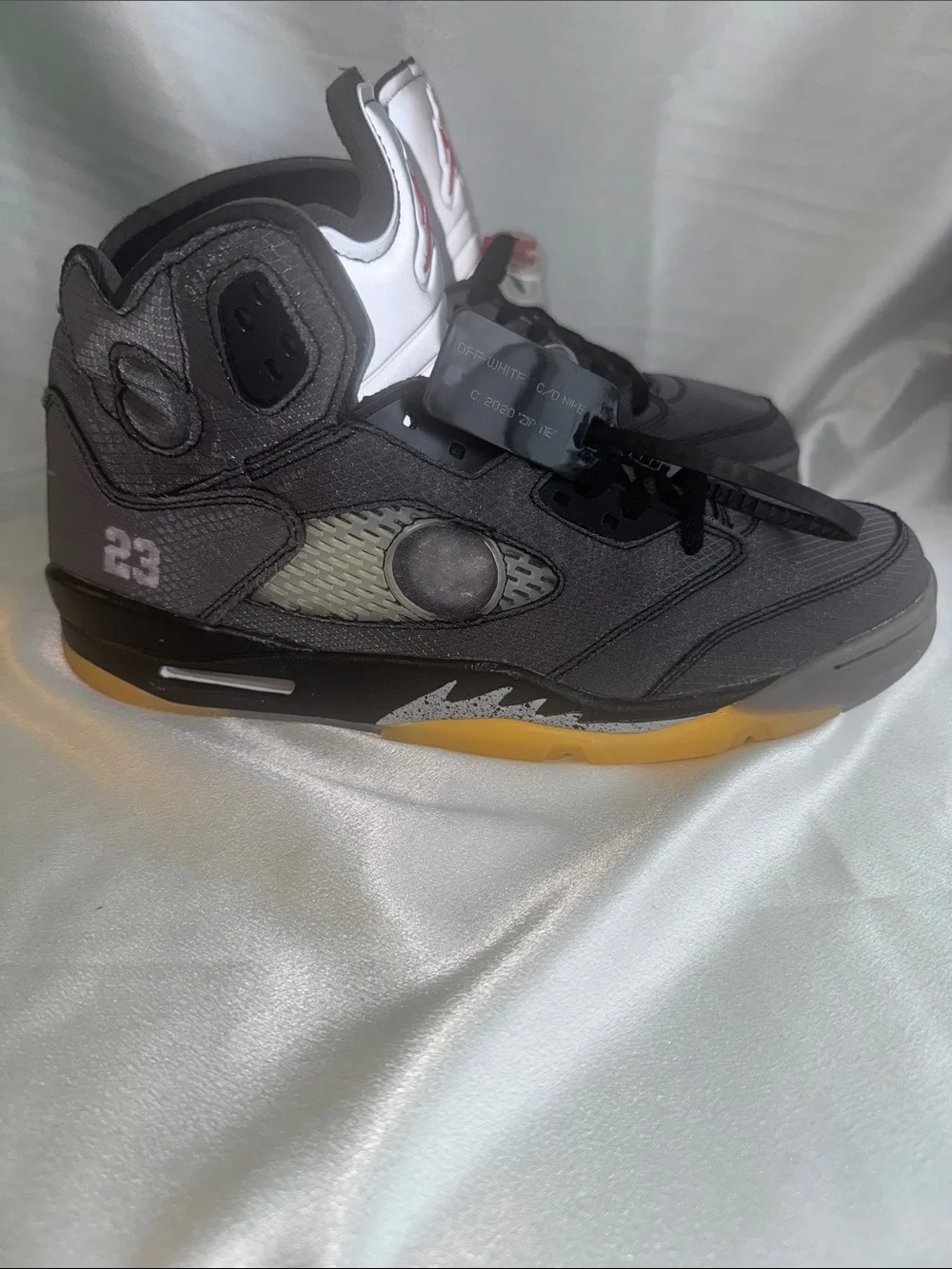 New! Off-White x Air Jordan 5 Retro SP 'Muslin' features a faded black textile